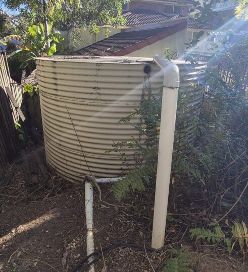 water tank removal before JDF plumbing drainage plumber
